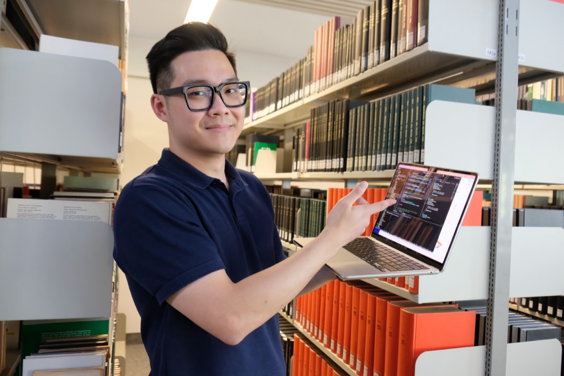 TuttyLab founder working on the project in the library